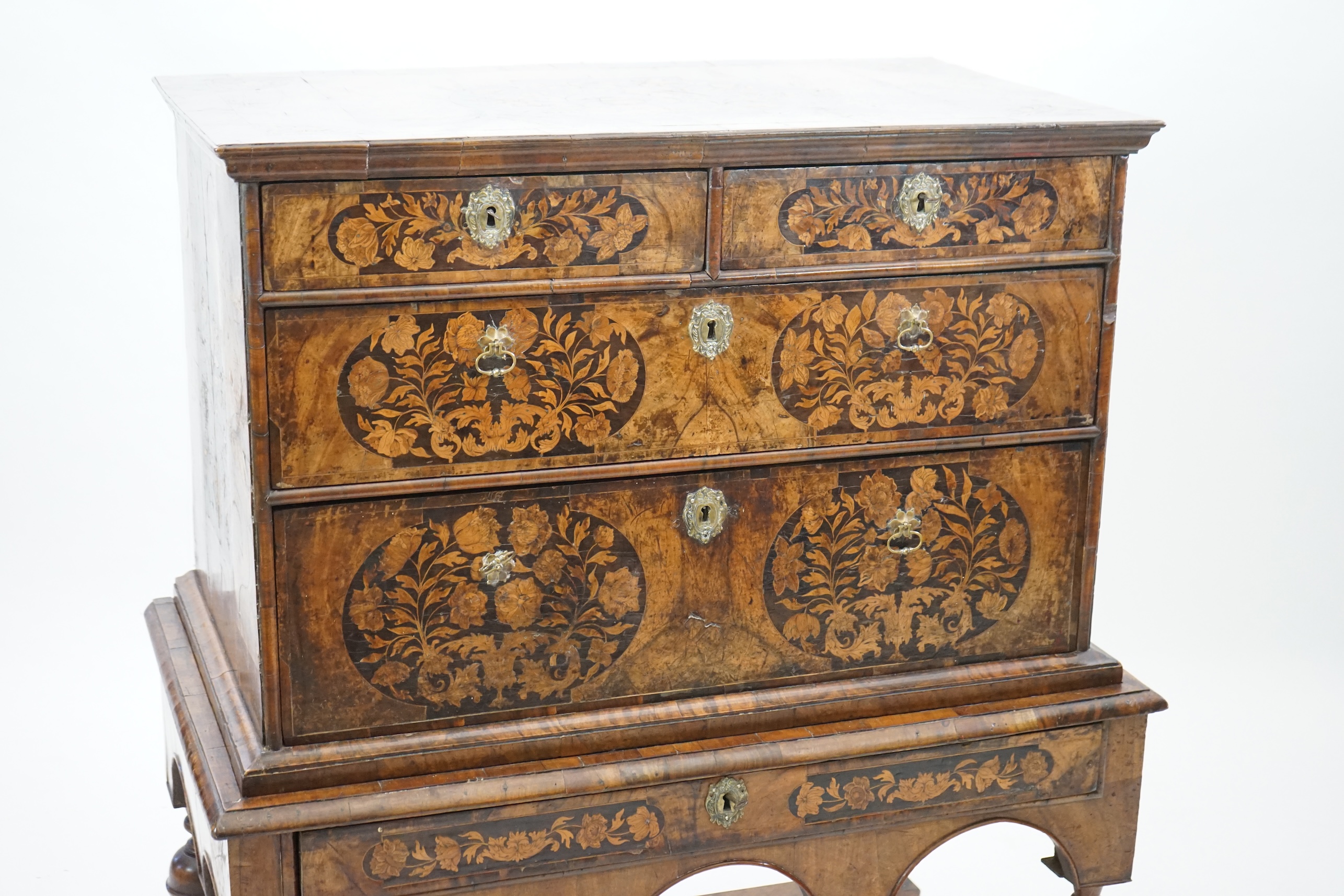 A William and Mary walnut and marquetry chest on stand